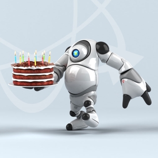 Robot som holder kake.